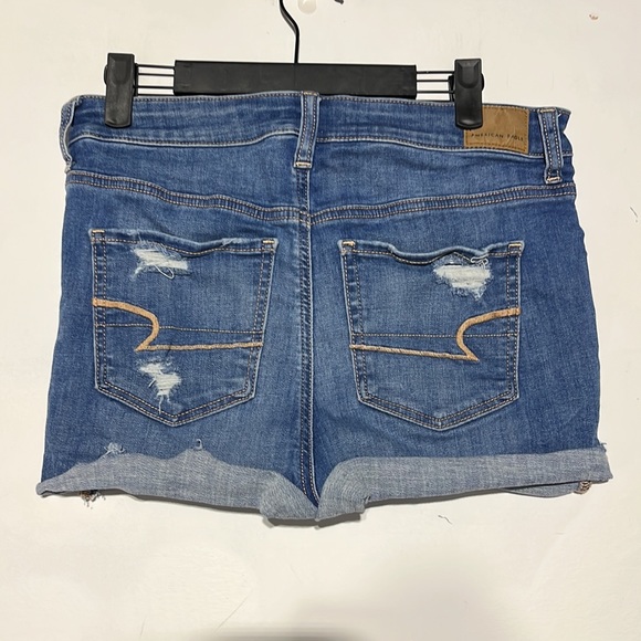American Eagle Ne(x)t Level Stretch Hi-Rise Shortie Medium Wash Denim Shorts 10 - Picture 5 of 9